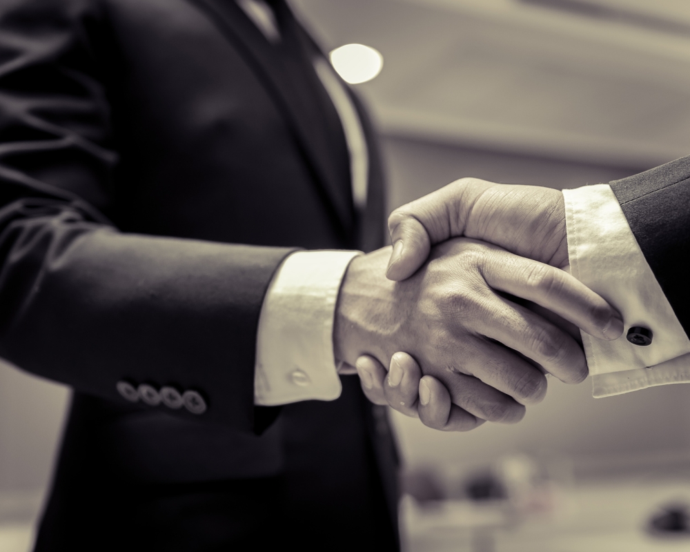 business-people-shaking-hands-finishing-up-a-meetingnegotiations-were-successfully Business people shaking hands, finishing up a meeting,Negotiations were successfully