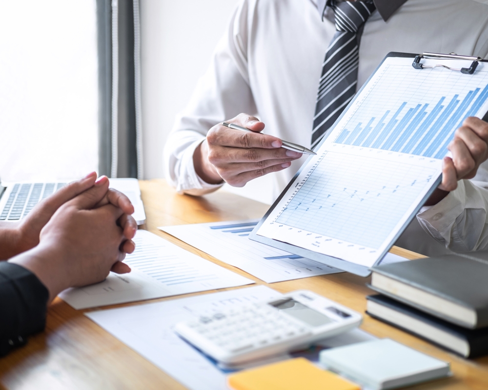 Professional Executive business team brainstorming on meeting to Professional Executive business team brainstorming on meeting to planning investment project working and strategy of business making conversation with partner and consultation of collaboration.